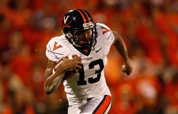 CLEMSON, SC - NOVEMBER 21:  Chase Minnifield #13 of the Virginia Cavaliers runs with the ball during the game against the Clemson Tigers at Memorial Stadium on November 21, 2009 in Clemson, South Carolina.  (Photo by Streeter Lecka/Getty Images)