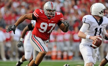 COLUMBUS, OH - NOVEMBER 13:  Cameron Heyward #97 of the Ohio State Buckeyes chases after quarterback Matt McGloin #11 of the Penn State Nittany Lions at Ohio Stadium on November 13, 2010 in Columbus, Ohio.  (Photo by Jamie Sabau/Getty Images)