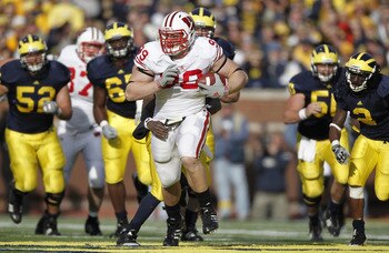 ANN ARBOR, MI - NOVEMBER 20:  J.J. Watt #99 of the Wisconsin Badgers tries to outrun the Michigan offense after intercepting a fourth quarter pass while playing the Michigan Wolverines at Michigan Stadium on November 20, 2010 in Ann Arbor, Michigan. Wisco