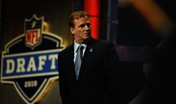 NEW YORK - APRIL 22:  NFL Commissioner Roger Goodell looks on as he stands on stage during the first round of the 2010 NFL Draft at Radio City Music Hall on April 22, 2010 in New York City.  (Photo by Jeff Zelevansky/Getty Images)