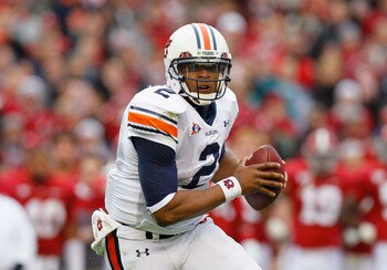 TUSCALOOSA, AL - NOVEMBER 26:  Quarterback Cam Newton #2 of the Auburn Tigers rushes out of the pocket against the Alabama Crimson Tide at Bryant-Denny Stadium on November 26, 2010 in Tuscaloosa, Alabama.  (Photo by Kevin C. Cox/Getty Images)