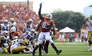 AUSTIN, TX - SEPTEMBER 25:  Defensive end Sam Acho #81 of the Texas Longhorns reacts after making a fumble recovery against the UCLA Bruins at Darrell K Royal-Texas Memorial Stadium on September 25, 2010 in Austin, Texas.  (Photo by Ronald Martinez/Getty
