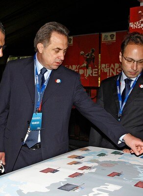 CAPE TOWN, SOUTH AFRICA - DECEMBER 4:  In this handout image provided by the 2010 FIFA World Cup Organising Committee South Africa, Vitaly Mutko (Russia Sports Minister) shows 2010 FIFA World Cup South OC CEO Danny Jordaan the Russian Bid Cities on a map