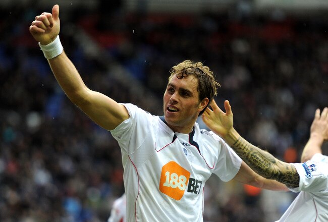 WIGAN, ENGLAND - OCTOBER 23:  Johan Elmander of Bolton Wanderers celebrates scoring his team's first goal during the Barclays Premier League match between Wigan Athletic and Bolton Wanderers at the DW Stadium on October 23, 2010 in Wigan, England.  (Photo