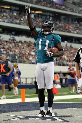 ARLINGTON, TX - OCTOBER 31:  Wide receiver Mike Sims-Walker #11 of the Jacksonville Jaguars celebrates a touchdown against the Dallas Cowboys in the first quarter at Cowboys Stadium on October 31, 2010 in Arlington, Texas.  (Photo by Ronald Martinez/Getty