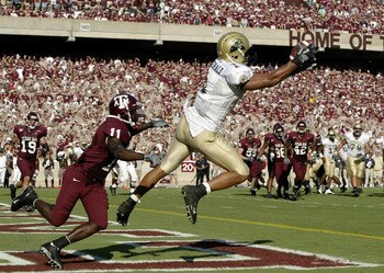 COLLEGE STATION, TX - SEPTEMBER 27:  Wide receiver Larry Fitzgerald #1 of the University of Pittsburgh Panthers pulls in a touchdown pass against the Texas A&M University Aggies at Kyle Field on September 27, 2003 in College Station, Texas. Pittsburgh def
