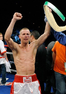 LAS VEGAS - APRIL 03:   Jason Litzau celebrates his win over Rocky Juarez in their super featherweight bout at the Mandalay Bay Events Center April 3, 2010 in Las Vegas, Nevada. Litzau won by technical unanimous decision after the fight was stopped in the