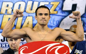 LAS VEGAS - JULY 30:  WBA/WBO lightweight champion Juan Manuel Marquez poses on the scale during the official weigh-in for his fight against Juan Diaz at the Mandalay Bay Events Center July 30, 2010 in Las Vegas, Nevada. Marquez will defend his titles aga