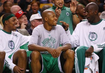 BOSTON - DECEMBER 07:   Paul Pierce #34, Ray Allen #20 and Kevin Garnett #5 of the Boston Celtics tries have fun on the bench in the fourth quarter against the Toronto Raptors on December 7, 2007 at the TD Banknorth Garden in Boston, Massachusetts. The Bo
