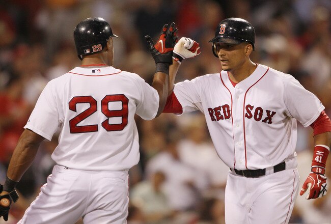 BOSTON - SEPTEMBER 08: Victor Martinez #41 of the Boston Red Sox is congratulated by teammate Adrian Beltre #29 after Martinez hit a solo home run against the Tampa Bay Rays on September 8, 2010 at Fenway Park in Boston, Massachusetts.  (Photo by Elsa/Get