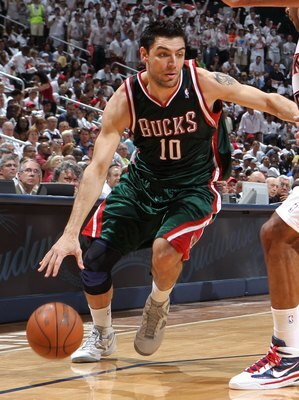 ATLANTA - MAY 2:  Forward Carlos Delfino #10 of the Milwaukee Bucks dribbles with the ball during Game Seven of the Eastern Conference Quarterfinals between the Milwaukee Bucks and the Atlanta Hawks during the 2010 NBA Playoffs at Philips Arena on May 2,
