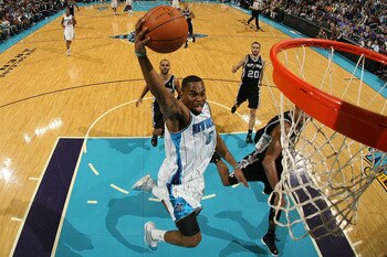 NEW ORLEANS - NOVEMBER 28:  Marcus Thornton #5 of the New Orleans Hornets makes a layup during the game against the San Antonio Spurs at the New Orleans Arena on November 28, 2010 in New Orleans, Louisiana.  NOTE TO USER: User expressly acknowledges and a