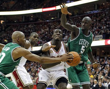 CLEVELAND - MAY 03:  J.J. Hickson #21 of the Cleveland Cavaliers tries to get around the defense of Ray Allen #20 and Kevin Garnett #5 of the Boston Celtics in Game Two of the Eastern Conference Semifinals during the 2010 NBA Playoffs at Quicken Loans Are