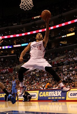 LOS ANGELES - NOVEMBER 3:  Eric Gordon #10 of the Los Angeles Clippers goes up for a shot against the Oklahoma City Thunder at Staples Center on November 3, 2010 in Los Angeles, California. The Clippers won 107-92.  NOTE TO USER: User expressly acknowledg