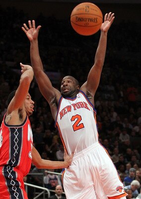 NEW YORK, NY - NOVEMBER 30:  Raymond Felton #2 of the New York Knicks loses possession of the ball against Devin Harris #34 of the New Jersey Nets on November 30, 2010 at Madison Square Garden in New York City. NOTE TO USER: User expressly acknowledges an