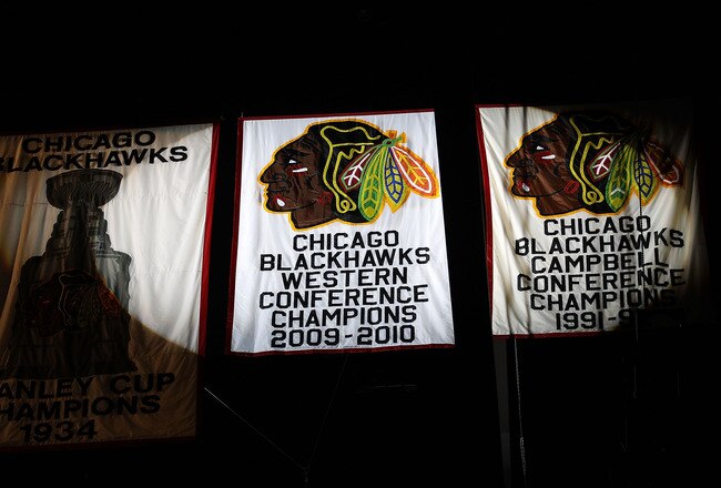 CHICAGO - OCTOBER 09: A Championship banner is seen during a ceremony before the Chicago Blackhawks season home opening game against the Detroit Red Wings at the United Center on October 9, 2010 in Chicago, Illinois. (Photo by Jonathan Daniel/Getty Images