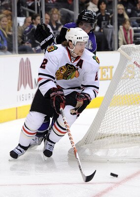 LOS ANGELES, CA - NOVEMBER 27:  Duncan Keith #2 of the Chicago Blackhawks skates away from Anze Kopitar #11 of the Los Angeles Kings during the game at Staples Center on November 27, 2010 in Los Angeles, California.  (Photo by Harry How/Getty Images)