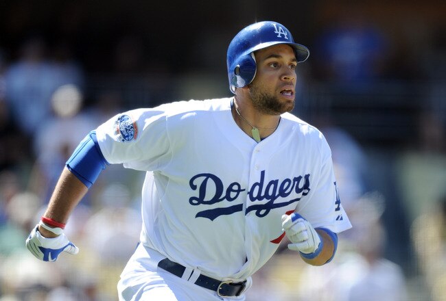 LOS ANGELES, CA - SEPTEMBER 01:  James Loney #7 of the Los Angeles Dodgers runs to first base against the Philadelphia Phillies at Dodger Stadium on September 1, 2010 in Los Angeles, California.  (Photo by Harry How/Getty Images)