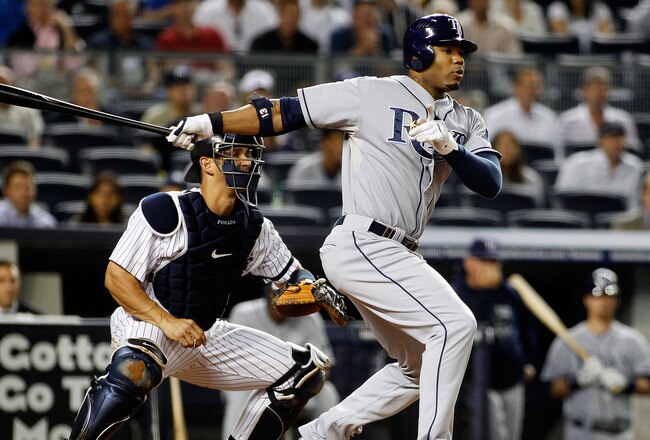 NEW YORK - SEPTEMBER 23: Carl Crawford ##13 of the Tampa Bay Rays grounds out in the first-inning against the New York Yankees on September 23, 2010 at Yankee Stadium in the Bronx borough of New York City.  (Photo by Mike Stobe/Getty Images)