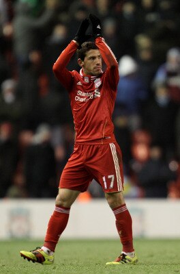 LIVERPOOL, ENGLAND - DECEMBER 06:   Maxi Rodriguez of Liverpool acknowledges the crowd during the Barclays Premier League match between Liverpool and Aston Villa at Anfield on December 6, 2010 in Liverpool, England. (Photo by Mark Thompson/Getty Images)