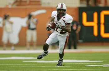 AUSTIN, TX - SEPTEMBER 5:  Wide receiver Luther Ambrose #22 of the Louisiana Monroe Warhawks runs the ball for yardage during their game against the Texas Longhorns on September 5, 2009 at Darrell K Royal-Texas Memorial Stadium in Austin, Texas. The Longh