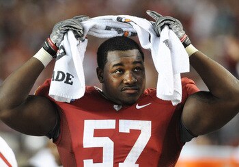 TUSCALOOSA, AL - NOVEMBER 13: Defensive lineman Marcell Dareus #57 of the Alabama Crimson Tide watches play against the Mississippi State Bulldogs November 13, 2010 at Bryant-Denny Stadium in Tuscaloosa, Alabama.  (Photo by Al Messerschmidt/Getty Images)