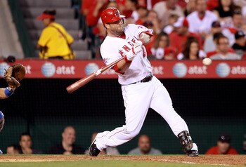 ANAHEIM, CA - JULY 01:  Mike Napoli #44 of the Los Angeles Angels of Anaheim hits an RBI double in the sixth inning against the Texas Rangers at Anaheim Stadium on July 1, 2010 in Anaheim, California.  (Photo by Jeff Gross/Getty Images)
