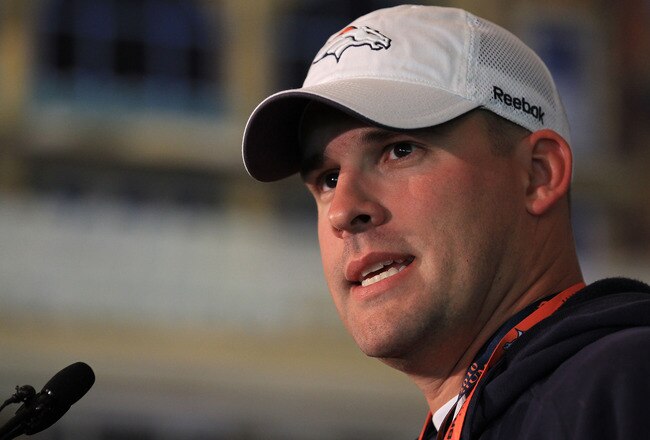 LONDON, ENGLAND - OCTOBER 29:  Head coach of the Denver Broncos Josh McDaniels speaks to the media during a press conference prior to the start of a team training session at The Brit Oval on October 29, 2010 in London, England. The Denver Broncos will pla
