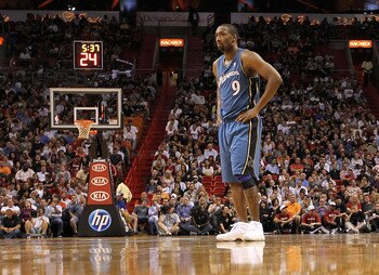 MIAMI, FL - NOVEMBER 29:  Gilbert Arenas #9 of the Washington Wizards looks on during a game against the Miami Heat at American Airlines Arena on November 29, 2010 in Miami, Florida. NOTE TO USER: User expressly acknowledges and agrees that, by downloadin