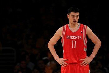 LOS ANGELES, CA - OCTOBER 26:  Yao Ming #11 of the Houston Rockets looks on during their opening night game against the Los Angeles Lakers at Staples Center on October 26, 2010 in Los Angeles, California. NOTE TO USER: User expressly acknowledges and agre