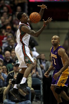 MILWAUKEE - NOVEMBER 16: Brandon Jennings #3 of the Milwaukee Bucks grabs the ball in front of Derek Fisher #2 of the Los Angeles Lakers at the Bradley Center on November 16, 2010 in Milwaukee, Wisconsin. The Lakers defeated the Bucks 118-107. NOTE TO USE