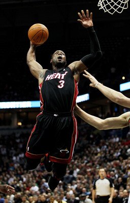 MILWAUKEE, WI - DECEMBER 06: Dwyane Wade #3 of the Miami Heat goes up for a shot against the ilwaukee Bucks at the Bradley Center on December 6, 2010 in Milwaukee, Wisconsin. NOTE TO USER: User expressly acknowledges and agrees that, by downloading and/or