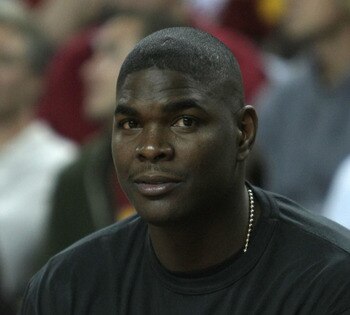 LOS ANGELES, CA - NOVEMBER 29: Former USC Trojan Keyshawn Johnson watches the game between the USC Trojans and the Oklahoma Sooners during the second half at the Galen Center on November 29, 2007 in Los Angeles, California. The Trojans won 66-55.  (Photo 
