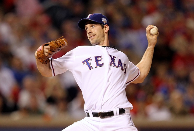 ARLINGTON, TX - NOVEMBER 01:  Cliff Lee #33 of the Texas Rangers pitches against the San Francisco Giants in Game Five of the 2010 MLB World Series at Rangers Ballpark in Arlington on November 1, 2010 in Arlington, Texas.  (Photo by Ronald Martinez/Getty