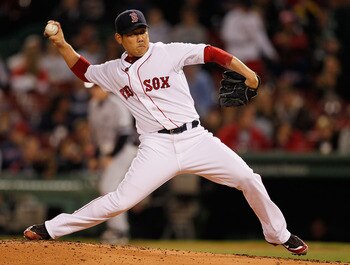 BOSTON - OCTOBER 2:  Daisuke Matsuzaka #18 of the Boston Red Sox throws against the New York Yankees in the second game of a doubleheader at Fenway Park, October 2, 2010, in Boston, Massachusetts. (Photo by Jim Rogash/Getty Images)