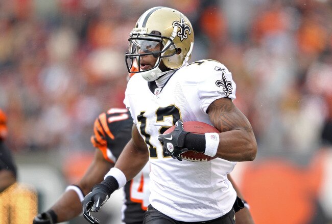 CINCINNATI, OH - DECEMBER 05:  Marques Colston #12 of the New Orleans Saints runs with the ball during the NFL game against the Cincinnati Bengals at Paul Brown Stadium on December 5, 2010 in Cincinnati, Ohio.  The Saints won 34-30.  (Photo by Andy Lyons/