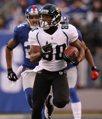 EAST RUTHERFORD, NJ - NOVEMBER 28:  Mike Thomas #80 of the Jacksonville Jaguars makes a break against the New York Giants at New Meadowlands Stadium on November 28, 2010 in East Rutherford, New Jersey.  (Photo by Chris McGrath/Getty Images)