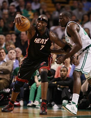 BOSTON - APRIL 27:  Jermaine O'Neal #7 of the Miami Heat tries to hang on to the ball as Kendrick Perkins #43 of the Boston Celtics defends during Game Five of the Eastern Conference Quarterfinals of the 2010 NBA playoffs at the TD Garden on April 27, 201