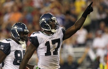 GLENDALE, AZ - NOVEMBER 14:  Wide receiver Mike Williams #17 of the Seattle Seahawks celerates after making a reception for a first down against the Arizona Cardinals at University of Phoenix Stadium on November 14, 2010 in Glendale, Arizona. Seattle won