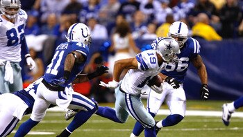 INDIANAPOLIS, IN - DECEMBER 05: Miles Austin #19 of the Dallas Cowboys runs against the Indianapolis Colts at Lucas Oil Stadium on December 5, 2010 in Indianapolis, Indiana. The Cowboys defeated the Colts 38-35 in overtime. (Photo by Scott Boehm/Getty Ima