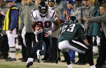 PHILADELPHIA, PA - DECEMBER 02:  Andre Johnson #80 of the Houston Texans runs for yards after the catch in the second half against Dimitri Patterson #23 of the Philadelphia Eagles at Lincoln Financial Field on December 2, 2010 in Philadelphia, Pennsylvani