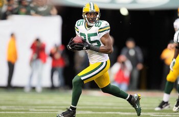 EAST RUTHERFORD, NJ - OCTOBER 31:  Greg Jennings #85 of the Green Bay Packers runs the ball against the New York Jets on October 31, 2010 at the New Meadowlands Stadium in East Rutherford, New Jersey.  (Photo by Jim McIsaac/Getty Images)