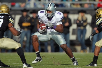 BOULDER, CO - NOVEMBER 20: Daniel Thomas #8 of the Kansas State Wildcats rushes with the ball against the Colorado Buffaloes at Folsom Field on November 20, 2010 in Boulder, Colorado. Colorado defeated Kansas State 44-36. (Photo by Doug Pensinger/Getty