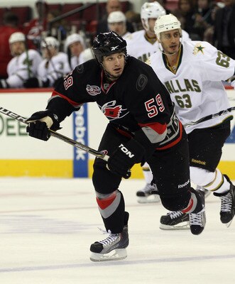 RALEIGH, NC - NOVEMBER 29:  Chad LaRose #59 of the Carolina Hurricanes skates against the Dallas Stars at the RBC Center on November 29, 2010 in Raleigh, North Carolina. The Stars defeated the Hurricanes 4-1.  (Photo by Bruce Bennett/Getty Images)
