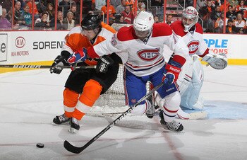 PHILADELPHIA - NOVEMBER 22:  P.K. Subban #76 of the Montreal Canadiens and Danny Briere #48 of The Philadelphia Flyers battle for the puck during their game on November 22, 2010 at The Wells Fargo Center in Philadelphia, Pennsylvania.  (Photo by Al Bello/