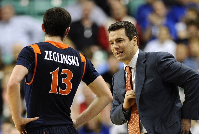 GREENSBORO, NC - MARCH 12:  Sammy Zeglinski and Tony Bennett, head coach of the University of Virginia Cavaliers confer in a quarterfinal game against the Duke Blue Devils in the 2010 ACC Men's Basketball Tournament at the Greensboro Coliseum on March 12,