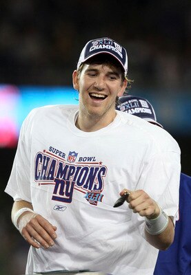 GLENDALE, AZ - FEBRUARY 03:  Quarterback Eli Manning #10 of the New York Giants reacts after the Giants defeated the New England Patriots 17-14 during Super Bowl XLII on February 3, 2008 at the University of Phoenix Stadium in Glendale, Arizona.  (Photo b