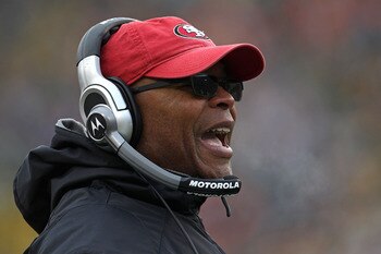 GREEN BAY, WI - DECEMBER 05: Head coach Mike Singletary of the San Francisco 49ers gives instructions to his team against the Green Bay Packers at Lambeau Field on December 5, 2010 in Green Bay, Wisconsin. The Packers defeated the 49ers 34-16. (Photo by J