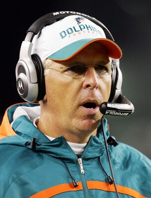 FOXBORO, MA - DECEMBER 23:  Head coach Cam Cameron of the Miami Dolphins looks on against the New England Patriots during their game at Gillette Stadium on December 23, 2007 in Foxboro, Massachusetts.  (Photo by Jim McIsaac/Getty Images)