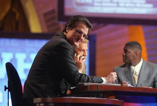 NEW YORK - APRIL 28:  Mel Kiper, Chris Mortensen and Keyshawn Johnson broadcast for ESPN during the 2007 NFL Draft on April 28, 2007 at Radio City Music Hall in New York, New York. (Photo by Chris McGrath/Getty Images)